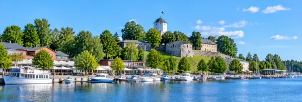 Lappeenranta Fortress overlooking the harbor with boats and historic stone buildings in Finland