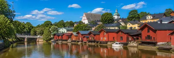 Porvoo, Finland, with red wooden riverside houses, colorful buildings, and historic Porvoo Cathedral