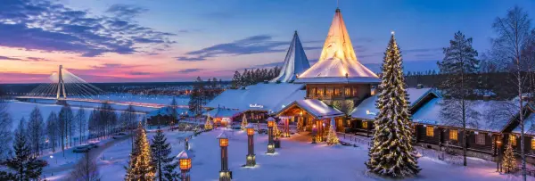 Rovaniemi, Finland, covered in snow with festive lights and Arctic winter scenery