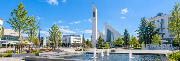Seinäjoki city square with a modern white church, fountain and landscaped surroundings in Finland