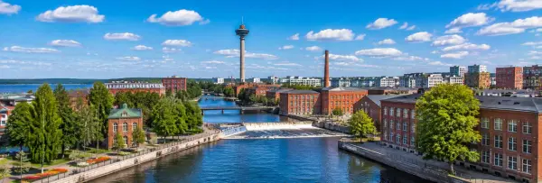Tampere, Finland, with the Tammerkoski rapids, red-brick industrial buildings, and Näsinneula Tower