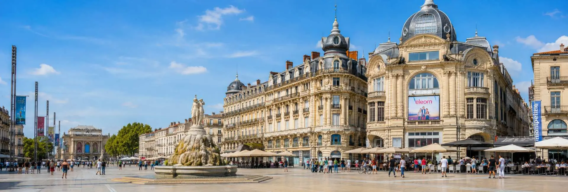 Place de la Comédie in Montpellier, France, with historic architecture, cafés and the Three Graces fountain
