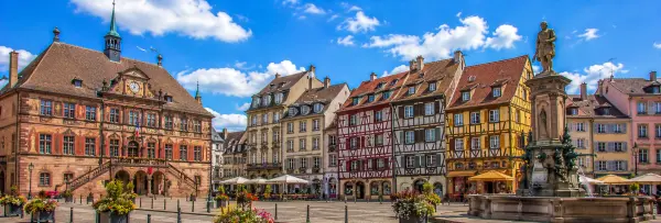 Mulhouse historic center with colorful half-timbered houses and Saint-Étienne Temple