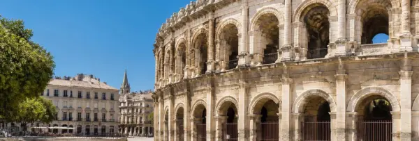 Nîmes Roman amphitheatre under a clear blue sky