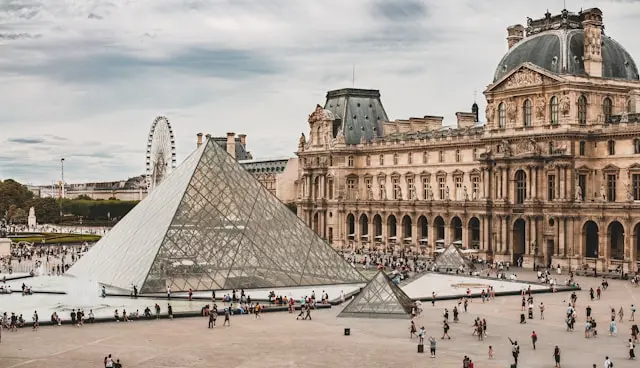 Louvre Museum and glass pyramid in Paris