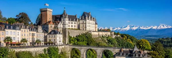 Pau, France, with Château de Pau overlooking the Pyrenees and historic city rooftops