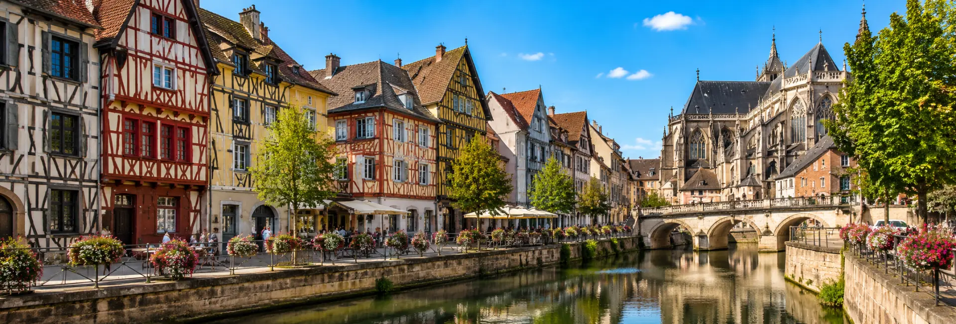 Troyes, France with colorful half-timbered houses and historic architecture along the canal.