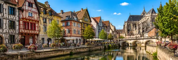 Troyes, France with colorful half-timbered houses and historic architecture along the canal.