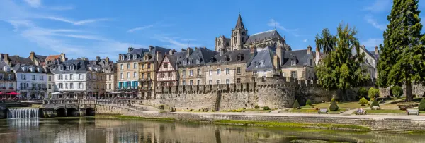Vannes, France, with medieval half-timbered houses, historic ramparts, gardens, and cathedral
