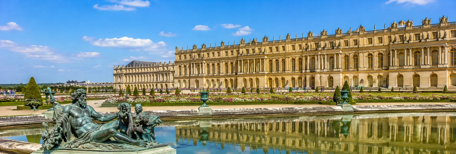 Palace of Versailles, France, with its grand Baroque façade and formal French gardens
