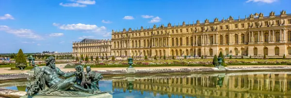Palace of Versailles, France, with its grand Baroque façade and formal French gardens