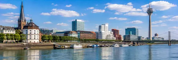 Düsseldorf Germany skyline with Rhine River, Old Town, St. Lambertus Church and Rhine Tower
