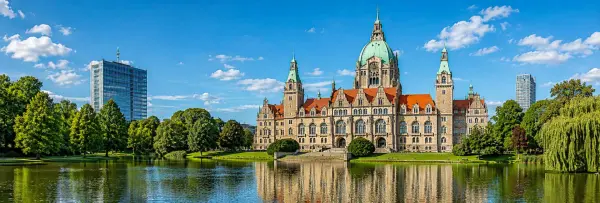 Hanover skyline with Neues Rathaus, Maschpark lake, fountain and Hannover TV Tower