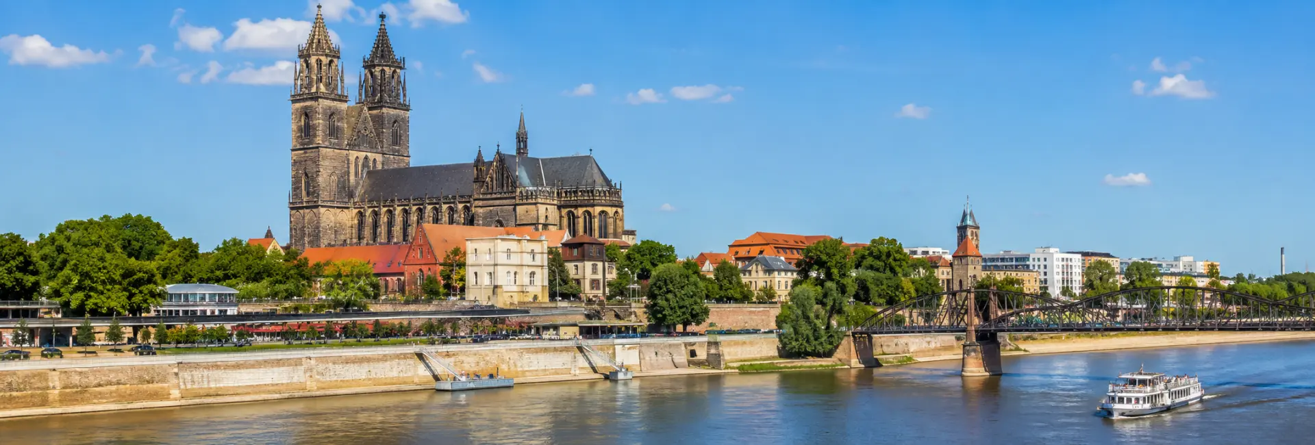Magdeburg Cathedral and historic cityscape along the Elbe River in Magdeburg, Germany