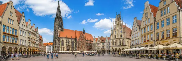 Münster, Germany historic Prinzipalmarkt with St. Lambert’s Church and Gothic buildings