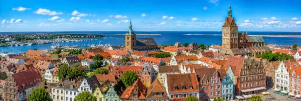 Panoramic view of Stralsund, Germany, with historic Hanseatic buildings, churches, harbor and Baltic Sea