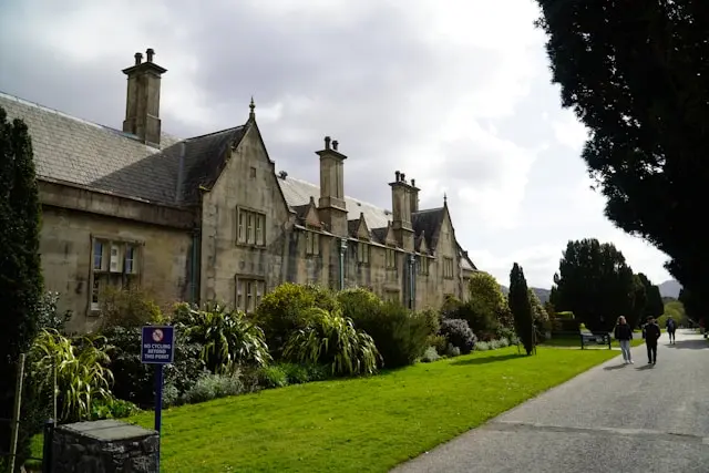 Historic stone building and landscaped grounds in Killarney, Ireland