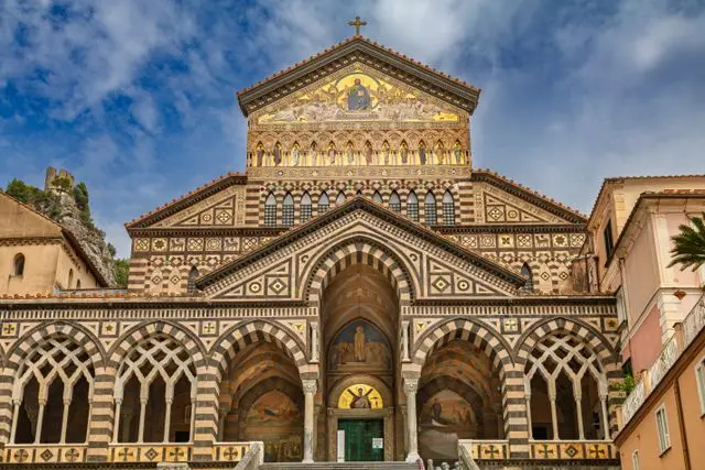 Amalfi Cathedral with its ornate striped facade in Amalfi, Italy