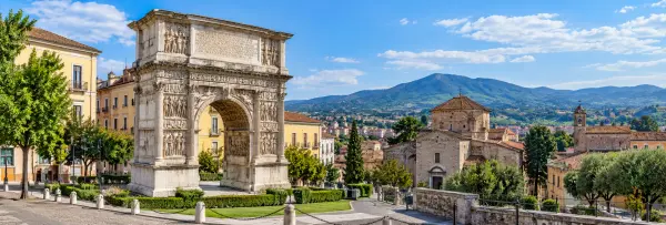 Benevento, Italy with the Arch of Trajan, historic center, and surrounding Campanian hills