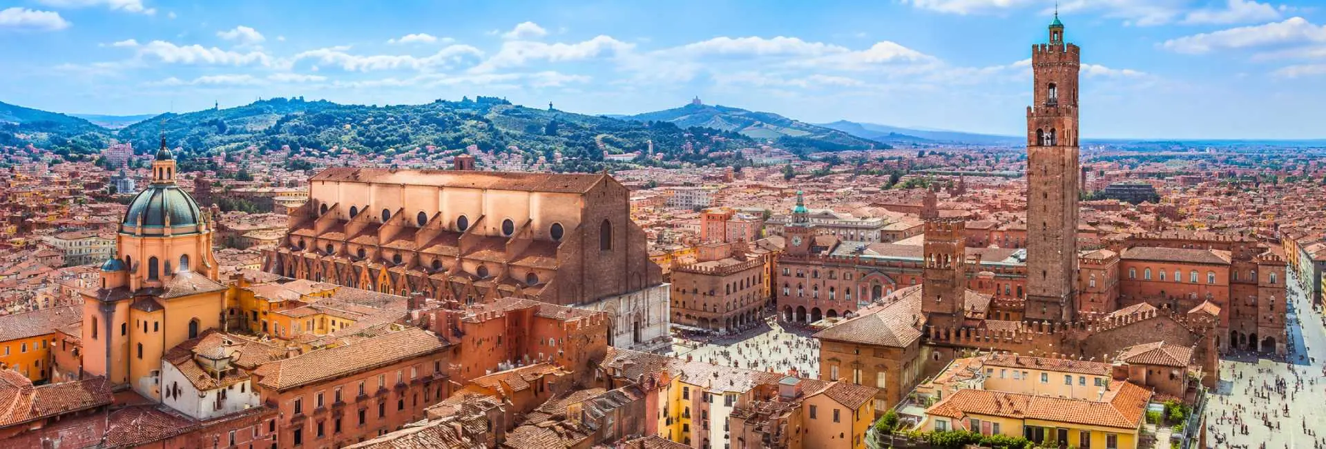 Bologna, Italy panoramic view of Piazza Maggiore, historic rooftops and medieval Two Towers