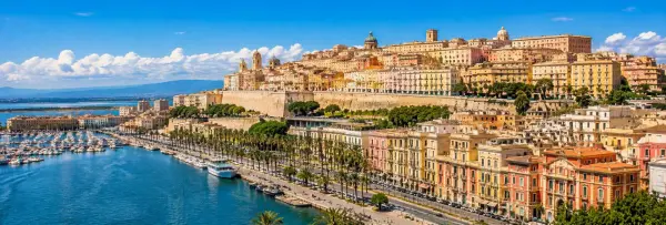 Panoramic view of Cagliari, Sardinia, with historic buildings, harbor and Mediterranean coastline