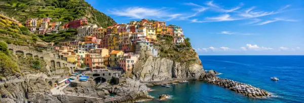 Cinque Terre, Italy with colorful cliffside villages, harbor and blue Mediterranean Sea