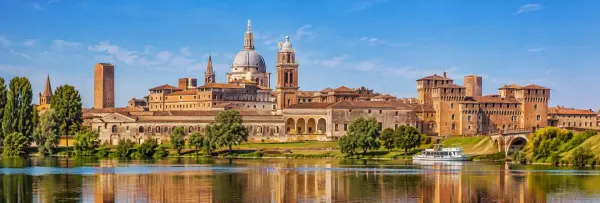 Mantua, Italy historic skyline with Renaissance architecture reflected in the tranquil lake