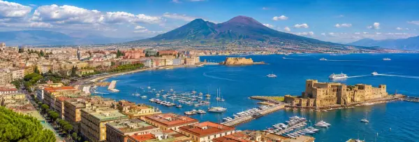 Naples waterfront with Castel dell’Ovo, Bay of Naples and Mount Vesuvius in Italy
