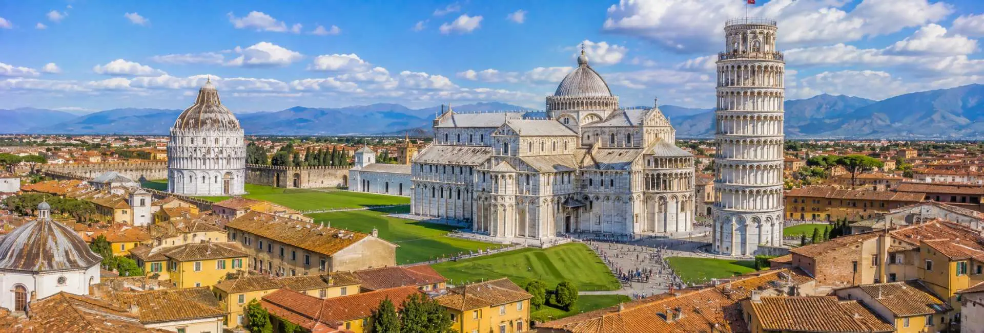 Pisa, Italy panoramic view of the Leaning Tower, Cathedral and Baptistery at Piazza dei Miracoli