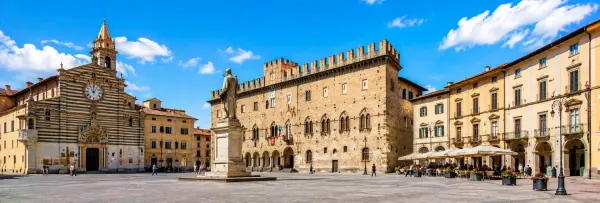 Historic Piazza del Comune with medieval architecture in Prato, Italy