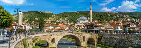 Panoramic view of Gjakova, Kosovo, with the historic bazaar, Hadum Mosque and surrounding mountains