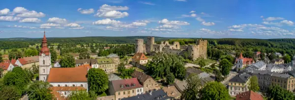 Panoramic view of Cēsis, Latvia, with medieval castle ruins and historic town