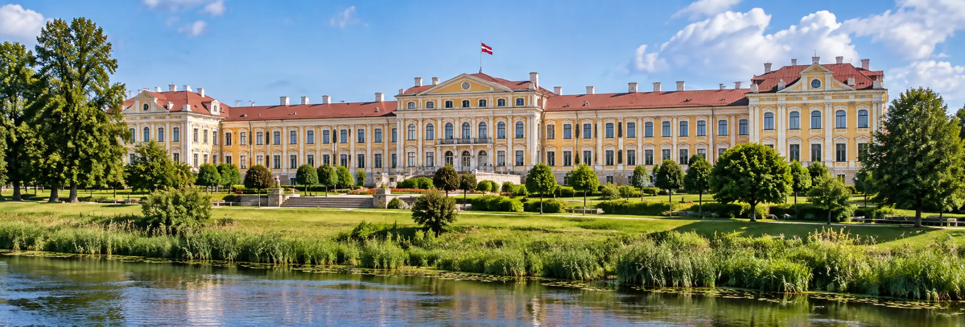 Jelgava Palace in Latvia, the grand Baroque landmark beside the river and landscaped palace grounds