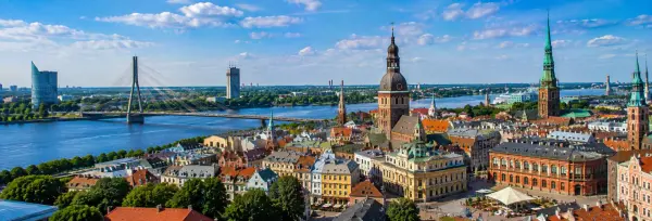 Panoramic view of Riga, Latvia, with Old Town, Daugava River and historic church towers