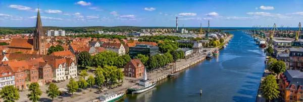 Klaipėda panoramic view with Old Town, Dane River waterfront, boats and Baltic Sea port