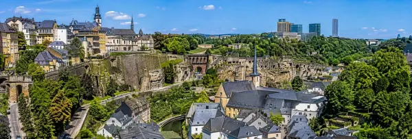Luxembourg City panoramic view with historic fortifications, old town rooftops and modern skyline