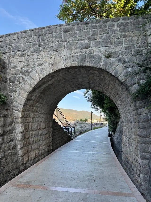 Historic stone archway and pathway in Herceg Novi, Montenegro