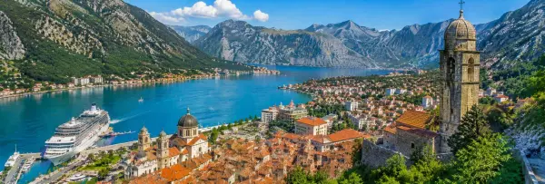 Kotor Old Town and Bay of Kotor surrounded by dramatic mountains in Montenegro.