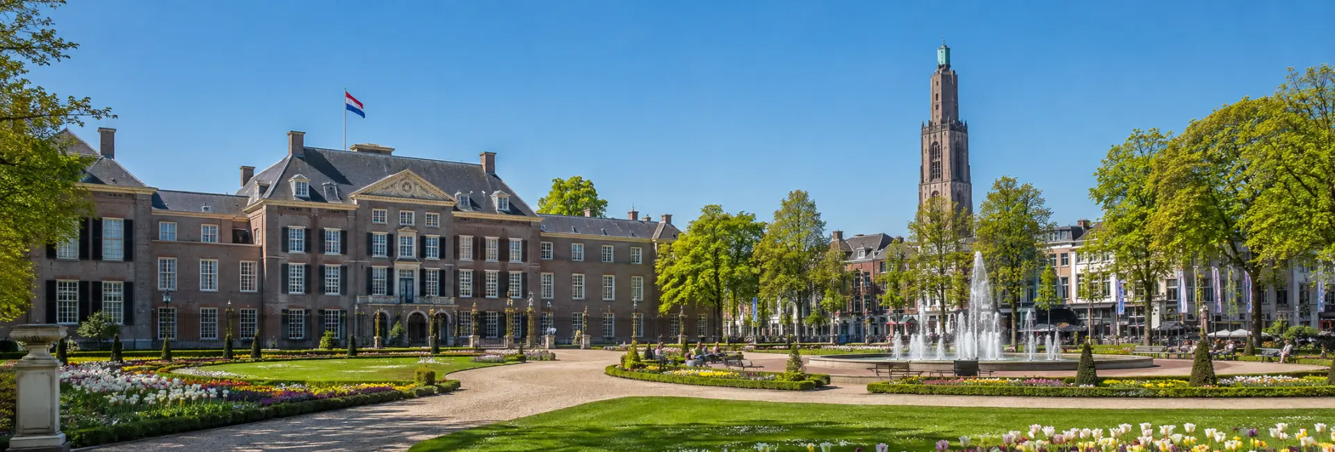 Apeldoorn, Netherlands with Het Loo Palace, formal gardens, fountains and historic city skyline