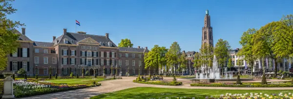 Apeldoorn, Netherlands with Het Loo Palace, formal gardens, fountains and historic city skyline