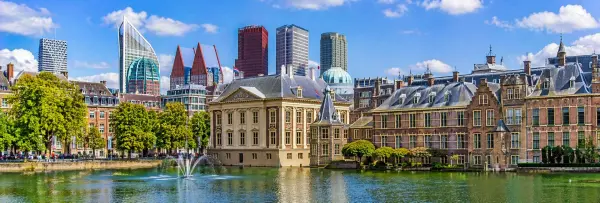 The Hague Netherlands skyline with Hofvijver, historic buildings and modern city towers