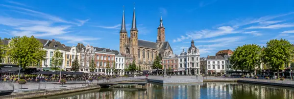 Tilburg, Netherlands city centre with Heuvelse Kerk, historic buildings and lively Heuvel square