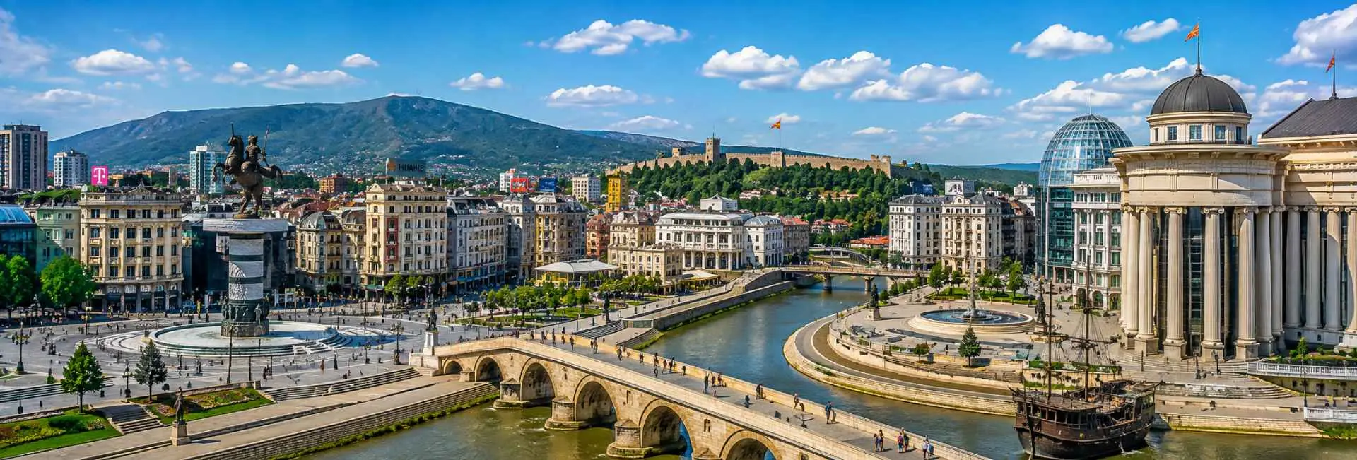 Skopje panoramic view with Stone Bridge, Vardar River, Macedonia Square and fortress