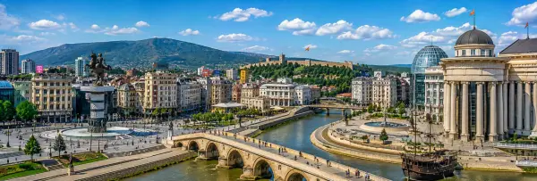 Skopje panoramic view with Stone Bridge, Vardar River, Macedonia Square and fortress