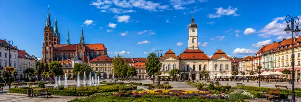 Białystok, Poland historic Market Square with colorful buildings, fountains, gardens, and church towers