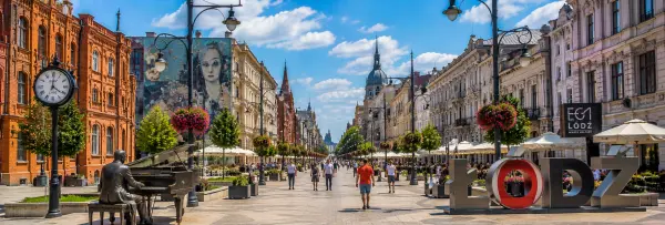 Łódź, Poland with historic Art Nouveau buildings, red-brick architecture, cafés, murals, and vibrant Piotrkowska Street