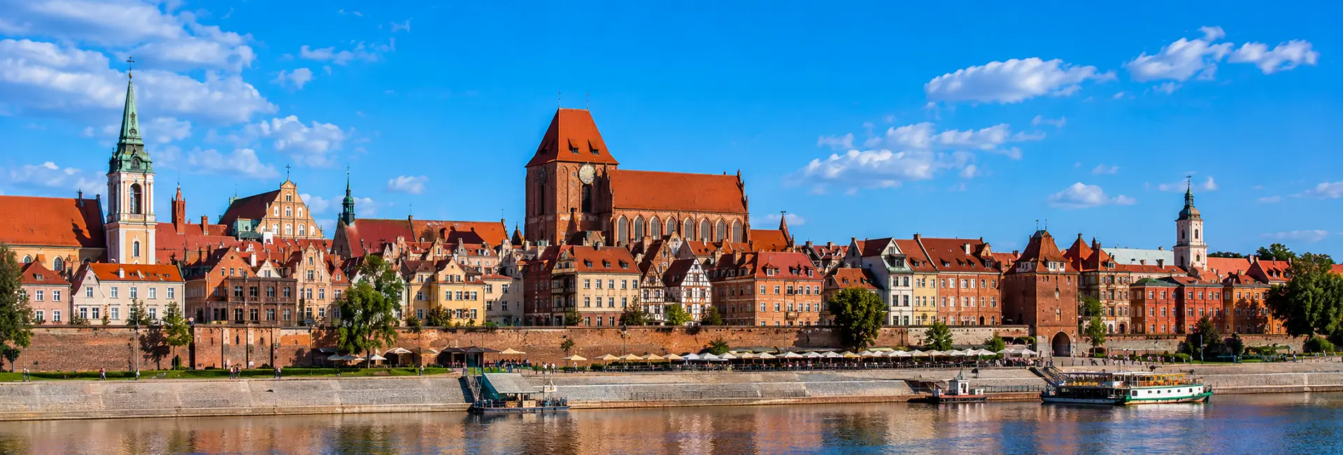 Historic Old Town skyline of Toruń, Poland along the Vistula River
