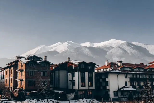 Snow-covered Zakopane houses with the Tatra Mountains in the background