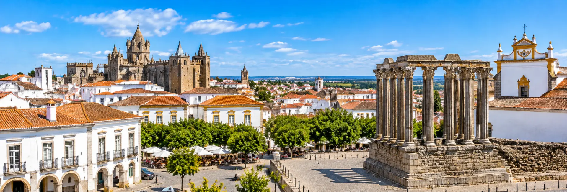 Évora, Portugal, with the Roman Temple, historic cathedral, whitewashed buildings, and terracotta rooftops.