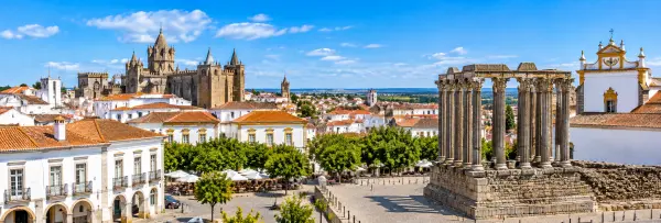 Évora, Portugal, with the Roman Temple, historic cathedral, whitewashed buildings, and terracotta rooftops.